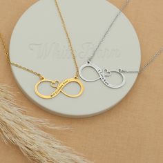 Embrace the timeless bond between mother and child with our Personalized Minimalist Infinity Necklaces. Crafted from durable stainless steel and featuring a waterproof design, these necklaces are a symbol of everlasting love and connection. The minimalist infinity pendant can be personalized with custom engraving, such as names, initials, or a meaningful date, adding a unique touch to this elegant piece of jewelry. Whether it's a Mother's Day gift, a birthday present, or a token of appreciation, Name Necklaces, Infinity Pendant, Infinity Necklace, Bridesmaid Necklace, Engraved Necklace, Mother And Child, Birthday Present, Personalized Products, Stainless Steel Chain