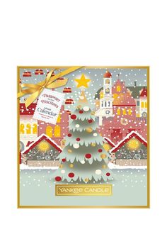 a card with a christmas tree on it in front of a snowy cityscape