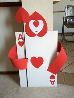 a card suit made out of paper with hearts on it