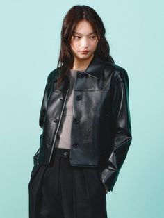 Soft and structured, this faux leather jacket features minimalistic silhouette in cropped length. Add yours over any items for a chic, daily mood. - Natural, standard silhouette- Classic open collars and button fastenings- Voluminous seam detail throughout- Casual side slits- Sleek, refined feel Sleek Faux Leather Outerwear With Button Closure, Modern Leather Jacket With Buttons For Fall, Leather Jacket With Buttons, Idk Aesthetic, Corporate Girlie, Dangerous Women, Fits Fall, Tomboy Femme, Collar Leather Jacket