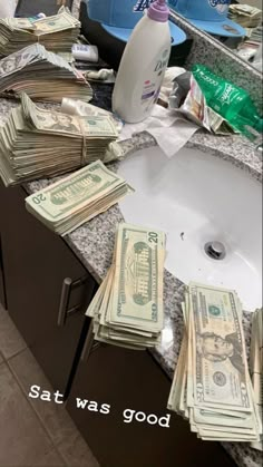 a counter top with lots of money on it