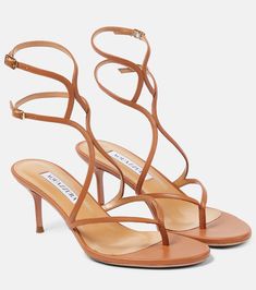 Baia leather thong sandals in neutrals - Aquazzura | Mytheresa Luxury Open Toe Slingback Sandals With Adjustable Straps, Brown Accessories, Aquazzura Shoes, Summer 2025, Mid Heel Sandals, Designer Pumps, Leather Thong Sandals, Evening Shoes, Thong Sandals