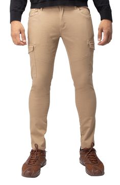 Solid chino pants constructed from comfortable stretch twill feature roomy cargo pockets for contemporary style. 13" leg opening; 9 3/4" front rise (size 32x32) Zip fly with button closure Five-pocket style Leg cargo pockets Skinny leg Stretch twill construction 64% cotton, 33% polyester, 3% spandex Machine wash, tumble dry Imported Model stats: 6'1" height, 32" waist. Model is wearing size 32x32. Fitted Khaki Cargo Pants With Tapered Leg, Fitted Khaki Tapered Leg Cargo Pants, Khaki Tapered Leg Chino Cotton Twill Cargo Pants, Fitted Khaki Cargo Pants With Patch Pockets, Fitted Khaki Cargo Pants With Hip Pockets, Khaki Stretch Tapered Leg Cargo Pants, Stretch Khaki Tapered Leg Cargo Pants, Utility Chino Cotton Twill Pants With Pockets, Chino Cotton Twill Cargo Pants With Pockets