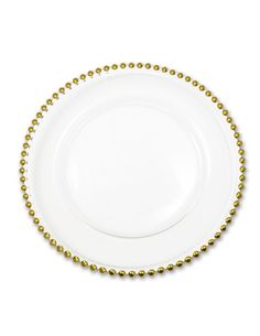 a white plate with gold beads on it