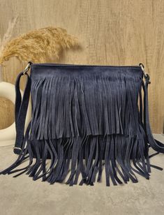 Soft Real Suede Leather Navy Fringe Tassel Crossbody Bag/ Suede Leather Dark Blue Shoulder bag Fringe bags/ Blue Suede Bags Gifts for her Zipper closure on top  2 fringed layers design  Back zipped pocket  Internal zipped pocket  Silver tone metal hardware  Fully lined inside  Soft Real Suede Leather  Handle drop: 60cm  Dimensions: H30cm x W32cm x D4cm Blue Shoulder Bag With Tassels For Daily Use, Blue Shoulder Bag With Tassels For Everyday Use, Blue Bag With Tassels For Everyday Use, Blue Everyday Bag With Tassels, Blue Fringe Shoulder Bag For Daily Use, Blue Fringe Bags For Daily Use, Blue Tassel Bags For Daily Use, Blue Shoulder Bag, Fringe Bags