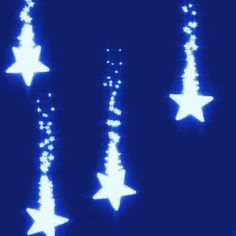 five white stars are glowing against a dark blue background in the shape of christmas trees