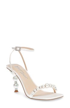 Pearly beads and dazzling embellishments lend timeless glamour to a luxe satin sandal fashioned with an angular square toe for contemporary appeal. 3 1/2" heel Adjustable ankle strap with buckle closure Cushioned footbed Synthetic upper, lining and sole Imported Elegant White Satin Sandals, White Satin Evening Sandals, Elegant Embellished Synthetic Sandals, Elegant Synthetic Sandals For Prom, Timeless Glamour, Strap Sandals Women, Sandal Fashion, Ankle Strap Sandals, Strap Sandals