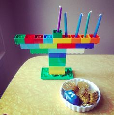 a lego table with coins and candles on it