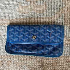 Some Wear And Tear But Good Condition. Goyard Clutch Printed Silver-Tone Hardware Leather Trim Embellishment & Single Exterior Pocket Canvas Lining Snap Closure At Front Goyard Clutch, Louis Blue, Goyard Bag, St Louis Blues, Leather Trim, St Louis, Leather Trims, Snap Closure, Embellishments