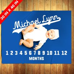 a baby laying on top of a blue birth mat with the words, michael lynn