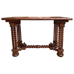 an old wooden table with beads hanging from it's sides and a white background