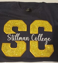 a black shirt with gold glitter letters and the number 39 on it