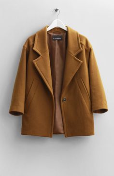 Wool all-over mustard coat with two front pockets and button front detail. Domed Sleeve. 75 cm long. Made in Canada. Long Khaki Coat, Brown Sweater Coat, Long Cashmere Cardigan, Mustard Coat, Long Brown Coat, Wool Short Coat, Khaki Coat, Long Sweater Coat, Lapel Coat