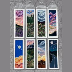 four cards with different scenes on them in the same color and size, each featuring an image of a night sky