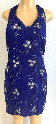 This sequin dress is handmade, high quality, original design and beautiful. This dress is suitable for party, events or any occasional use. Blue Embellished Sequin Summer Dress, Blue Embellished Sequin Dress For Summer, Blue Sequin Dress For Wedding, Embellished Evening Dress For Party, Glamorous Blue Sequin Dress With Fitted Bodice, Evening Embellished Sleeveless Sequin Fabric, Blue Dresses With Contrast Sequin For Night Out, Blue Glamorous Sequin Dress For Prom, Glamorous Blue Mini Dress With Fitted Bodice