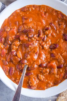 a white bowl filled with chili and beans