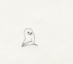 a drawing of a small bird sitting on top of a white paper with black ink