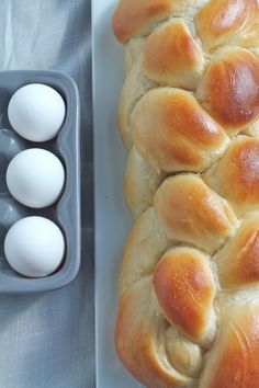 some bread and eggs on a table