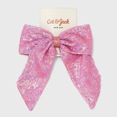 The Girls' Sequin Bow Barrette from Cat & Jack™ in charming pink lends sparkle to any outfit. With an easy-to-use design, the barrette effortlessly secures hair in place. Whether she's dressing up for a party or simply adding flair to her everyday look, this girls’ sequin bow barrette from Cat & Jack™ adds a pop of shimmer. Cat & Jack™: Classics with an imagination of their own Cute Spring Hair Accessories For Parties, Cute Spring Party Hair Accessories, Cute Summer Party Headband, Summer Party Hair Accessory With Decorative Bow, Spring Party Hair Accessories With Decorative Bow, Adjustable Decorative Bow Hair Accessory For Summer, Adjustable Hair Accessories With Decorative Bow For Summer, Party Headband With Decorative Bow, Adjustable Pink Bow For Party