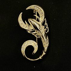 "This is a gorgeous sleek gold scorpion, adorned with faceted white jewels on the tail, body, and pincers that shimmer in the light. It is a really fun way to dress up any outfit. 1 1/3\" long, and it is 3/4\" wide. Make sure to check out my shop for more hair pins, jewelry, accessories, and all sorts of fun stuff! Scorpion Brooch, Gold Scorpion, Scorpion Jewelry, Insect Brooch, Gold Insect, Sleek Scorpion, Silver Brooch, Scorpion Pin" Scorpion Brooch, Lady Capulet, Scorpion Jewelry, Gold Scorpion, Octopus Jewelry, Insect Brooch, Silver Hair Comb, U Shaped Hair, Gold Brooch