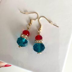 Look unique in this holiday with these handmade handmade cute blue red crystal earrings. I made these  minimalist earrings with red and blue  glass crystals and rhinestones.   Size: almost 1 inch. You can make a cute holiday outfit with this earrings! This dangle earrings makes a nice holiday gift. Great stockings stuffer gift will come in a beautifully wrapped gift box Nice Holiday, Winter Earrings, Blue Crystal Earrings, Diy Jewelry Unique, Jewelry Holiday, Holiday Earrings, Beaded Crafts, Earrings Christmas, Holiday Earring