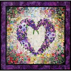 a heart made out of flowers on a purple background