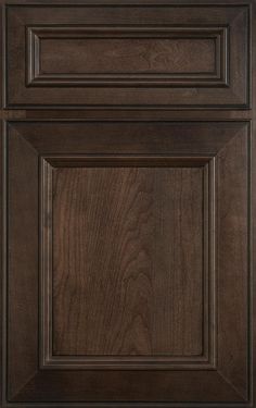 a close up view of the front and side panels of a cabinet door with dark wood grain