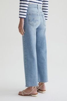 Upgrade your denim this Spring with the new AG Saige Wide Leg Jeans. These fashion forward wide leg, cropped jeans hug your waist with a high rise fit and a frayed hemline. 98% Cotton, 2% Elastan Front Rise: 10 1/4" Knee Opening: 20 1/4" Bottom Opening:21" Inseam: 27" Shop Other Colors in the Saige Crop Images Courtesy of AG Jeans Instagram Gift, Ag Jeans, Hug You, Cropped Jeans, Wide Leg Jeans, Leg Jeans, Fashion Forward, Denim Jeans, Wide Leg