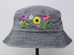 Item: mushroom embroidered bucket hat Material: 100% cotton Size: one size fits most Embroidery: hand made with acrylic thread Free first class shipping, upgradable priority mail service. 30 days return policy, feel confident at your purchase! Casual Embroidered 5-panel Hat, Spring Bucket Hat With Embroidered Logo, Casual Embroidered Bucket Hat For Beach, Casual Embroidered Bucket Hat, Embroidered Adjustable 5-panel Hat, Adjustable Embroidered 5-panel Hat, Adjustable Embroidered Cotton Bucket Hat, Embroidered Adjustable Bucket Hat, Adjustable Embroidered Bucket Hat