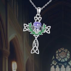 This elegant Scottish thistle pendant symbolizes bravery, devotion, and determination. Crafted from high-quality 925 sterling silver, it's hypoallergenic and perfect for sensitive skin. The necklace measures 0.82" x 1.39", making it a stylish and classic accessory for daily wear. A meaningful gift for loved ones, this beautifully detailed necklace brings positive energy and a pop of color to any outfit. Thistle Necklace, Cross Necklace For Women, Detailed Necklace, Scottish Thistle, Necklace For Women, Meaningful Gifts, Cross Necklace, Sensitive Skin, Womens Necklaces