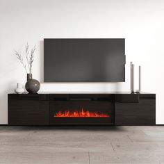 an entertainment center with a fireplace in the middle