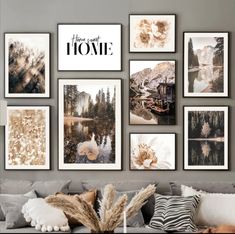 a living room filled with lots of pictures on the wall above a couch and coffee table