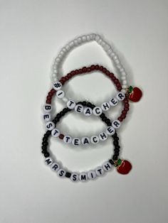 This bracelet is made with stretchy string, multi-color glass beads, and letters beads so you can create a customized gift for the best teacher in your life.   COLOR OPTIONS - please use the customization box to specify the desired color(s) SIZE - The bracelet is made in an average adult size and is stretchy so it should fit, if you are concerned about the size please reach out with exact size in inches.  CUSTOM NAME/WORD - if you choose a customizable word option, please be sure to include the name or word when ordering.  Feel free to reach out with any other questions or concerns! **Not recommended for children under 4 years old ** **Colors may vary for each bracelet** White Novelty Beaded Stretch Bracelet, White Beaded Novelty Stretch Bracelet, Multicolor Adjustable Beaded Bracelets For Teacher Appreciation, Adjustable Multicolor Beaded Bracelets For Teacher Appreciation, Novelty White Stretch Bracelet With Round Beads, White Novelty Stretch Bracelet With Round Beads, Personalized Flexible White Bracelets, Personalized White Flexible Bracelets, Novelty White Stretch Bracelet As Gift