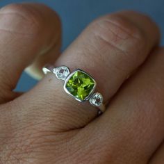 Green Peridot and White Sapphire Three Stone Ring Anniversary - Etsy Family Ring, Treasure Jewelry, Family Rings, Multi Gemstone Ring, August Birthstone Jewelry, Three Stone Ring, August Birthstone, Green Peridot, White Gold Band