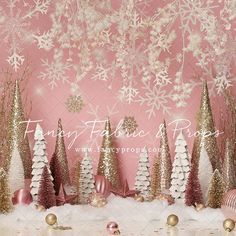 a pink and gold christmas backdrop with snowflakes, glitter trees, and ornaments