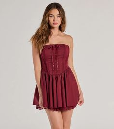 Adorably flirty, this woven skater dress is designed with a strapless straight neckline accented with a satin ribbon detail, a chic corset-style bodice with a dainty lace trim, and a lace-up back for a customized fit. The on-trend drop waist seam leads to a short pleated skater silhouette with the cutest sheer lace hem.Fit & FeaturesLined poplin woven fabric, minimal stretchStrapless straight neckline, satin ribbon detail, no-slip stripCorset-style bodice, flexible boning, lace trim designLa Orange Homecoming Dresses, Purple Homecoming Dress, Backless Dress Short, Green Homecoming Dresses, Trim Design, Lace Dress Styles, White Homecoming Dresses, Homecoming Outfits, Red Homecoming Dresses