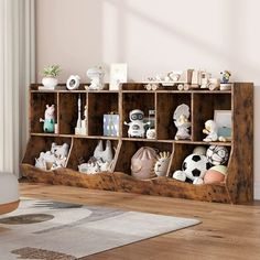 a wooden shelf filled with lots of stuffed animals