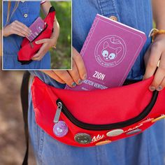 a woman holding a red book in her pocket with the zipper open to show it's contents