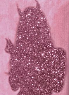 the silhouette of a woman's head is covered in pink sequins