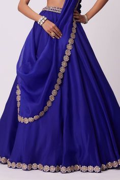 Blue flared attached cancan lehenga with mirror hand embroidery. Paired with a padded mirror embroidered blouse and dupatta with mirror embroidered border. - Aza Fashions Party Choli With Resham Embroidery In Royal Blue, Blue Art Silk Gown With Traditional Drape, Blue Chanderi Lehenga For Party, Blue Chanderi Choli For Party, Blue Party Choli In Chanderi, Royal Blue Wedding Dress With Pallu, Blue Dola Silk Choli For Parties, Blue Chanderi Saree Gown, Royal Blue Dresses For Wedding And Navratri