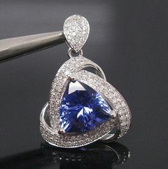 Stone Jewellery Designs, Diamond Wallpaper, Solitaire Rings, Wedding Pendant, Tanzanite Diamond, Diamond Jewelry Necklace, Blue Tanzanite, Diamond Flower