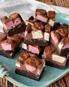 chocolate and marshmallow squares on a blue plate