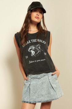 A mineral washed graphic tee with the following features: Vintage-style leopard graphic print with text that reads: "Break the Rules," "Stay True," and "Believe in Your Power". Cut-off sleeves with raw edge. Round neckline. Distressed detailing at neckline and hem. Relaxed fit. 100% Cotton. Imported top designed and printed in LA. Model wears size S. Trendy Graphic Print Crew Neck Tank Top, Edgy Sleeveless Graphic Print T-shirt, Edgy Sleeveless Graphic T-shirt, Trendy Crew Neck Tank Top With Screen Print, Grunge Crew Neck Tank Top With Letter Print, Crew Neck Graphic Print Tank Top, Graphic Print Crew Neck Tank Top, Casual Screen Print Muscle Tee With Relaxed Fit, Casual Muscle Tee With Screen Print In Relaxed Fit