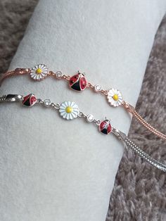 Sterling Silver Ladybug Bracelet-Daisy Flower Bracelet-Dainty Handmade Bracelet-Custom Bracelet-Populer Bracelet-Luck Bracelet-Love Bracelet-Bracelet for Women-Enameled Bracelet-Initial Bracelet-Gift For Her-Birthday Gift-Gift For Mom-Gift-Christmas Gift-New Year Gift-Bridesmaid Gift-Anniversarry Gift-Graduation Gift- Our product is produced with care from 925 Sterling Silver. There are 2 Models in our Bracelet. Enamel Application is Made on Daisy and Ladybug Figures. Our bracelet has 2 rows of Ladybug Bracelet, Bracelet Initial, Initial Bracelet, Flower Bracelet, Custom Bracelets, Christmas Gifts For Mom, Love Bracelets, Daisy Flower, New Year Gifts