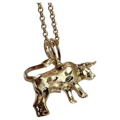 Bull pendant necklace in 14KT yellow gold, comes with 18 inches chain! GOLD: 14KT gold Grams:2.77 size: 18 inches chain Item#: 435-00042MTE WHAT YOU GET AT STAMPAR JEWELERS: Stampar Jewelers, located in the heart of Jupiter, Florida, is a custom jewelry store and studio dedicated to providing 100% satisfaction to each client. Our personal attention to detail, passion, affordability and honesty set us apart from any other store. We will bring full catering of our services to you online through ph Bull Pendant, Jupiter Florida, Chain Gold, 14kt Gold, Jewelry Stores, Custom Jewelry, Jewelry Necklace Pendant, Gold Necklace, Jewelry Necklaces