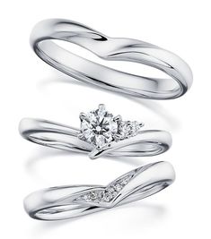 three different types of wedding rings with diamonds on each one and the other side, all in white gold