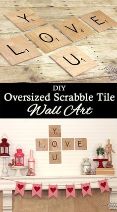 a fireplace mantle with valentine's day decorations on it and the words diy oversized scrabble tile wall art