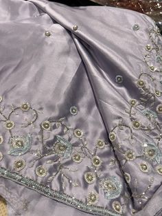 Gorgeous pastel lilac satin silk saree with hand embroidery and scalloped edges  custom made single piece designer saree  Hand made  Dry clean or spot clean only. Festive Embroidered Satin Saree, Elegant Purple Sets With Embroidered Border, Embroidered Satin Saree, Embroidered Satin Dupatta, Festive Silk Saree With Pearl Embroidery, Wedding Silk Saree With Pearl Embroidery, Elegant Embroidered Satin Traditional Wear, Purple Silk Dupatta With Embroidered Border, Embroidered Satin Dupatta For Eid