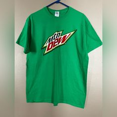 Vibrant Green, Mountain Dew Short Sleeve T-Shirt. Brand New, Never Worn. Unisex- Size Large Mountain Dew, Green Mountain, T Shirt Brand, Vibrant Green, Shirt Brand, Man Shop, Brand New, T Shirts, Tags