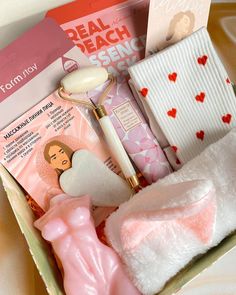 the contents of a beauty box are neatly packed and ready to be used as gifts